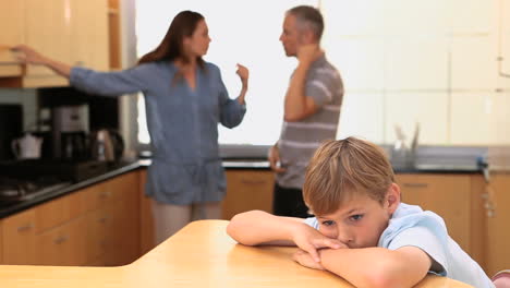 child listening to his quarreling parents