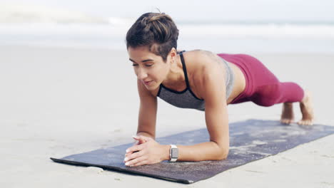 an-attractive-young-woman-doing-plank-exercises