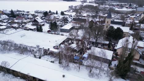 Christmas-market-Winter-Snow-Village,-cloudy-Germany