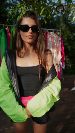 young woman in trendy neon outfit