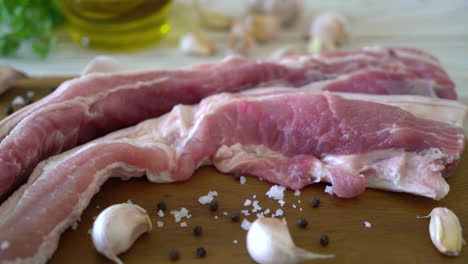 fresh-raw-streaky-pork-on-wood-board-with-ingredient