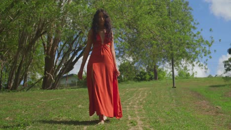 a young latina girl, dressed in a colorful outfit, explores a park on the caribbean island of trinidad