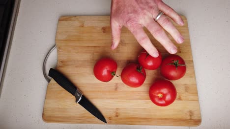 chef preparing tomatoes to eat