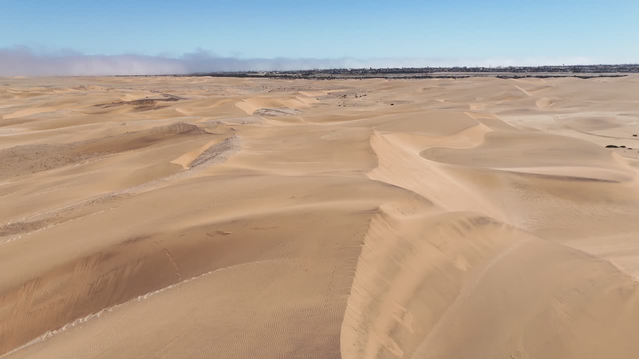 Scenic drone footage of rolling desert dunes around Swakopmund, Namibia,