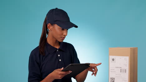 Delivery,-check-package-and-tablet-with-woman