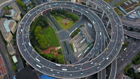 aerial view of roundabout of nanpu bridge, shanghai downtown, china. financial district and business centers in smart city in asia. top view of skyscraper and high-rise buildings.