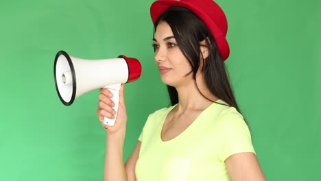 woman shouting on megaphone to winners