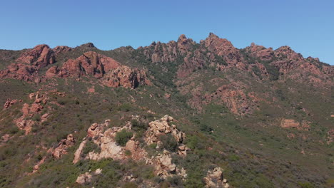 Rocky-Mediterranean-Mountain-Peaks-Against-Blue-Sky-During-Sunny-Summer-In-Sardinia,-Italy