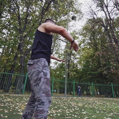 . young man exercise outdoors. athletic man training at the stadium