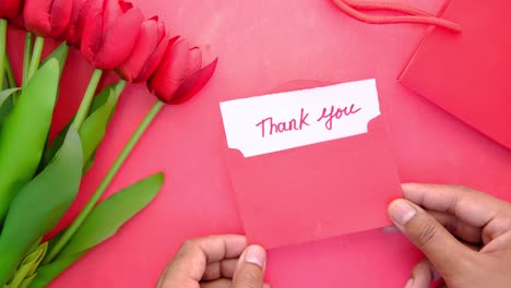 thank you note with red tulips