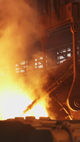 pouring molten metal in a steel mill