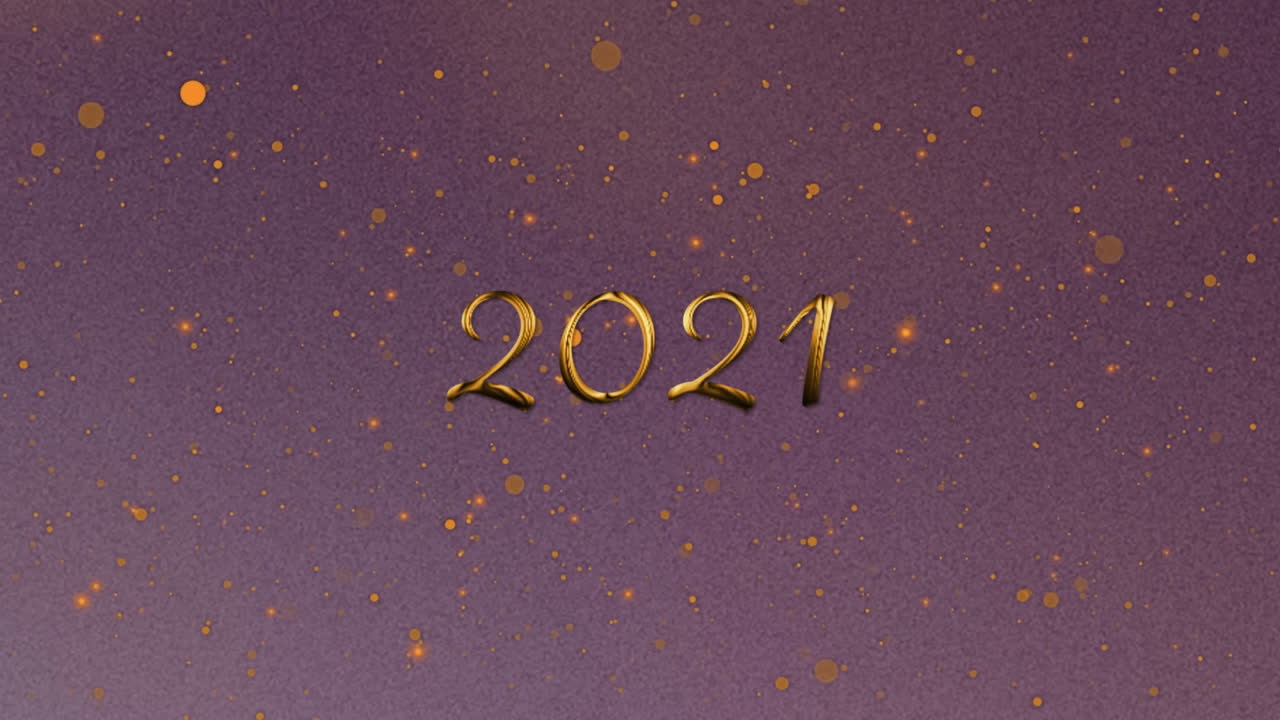 animación del texto de 2021 sobre luces brillantes sobre un fondo oscuro