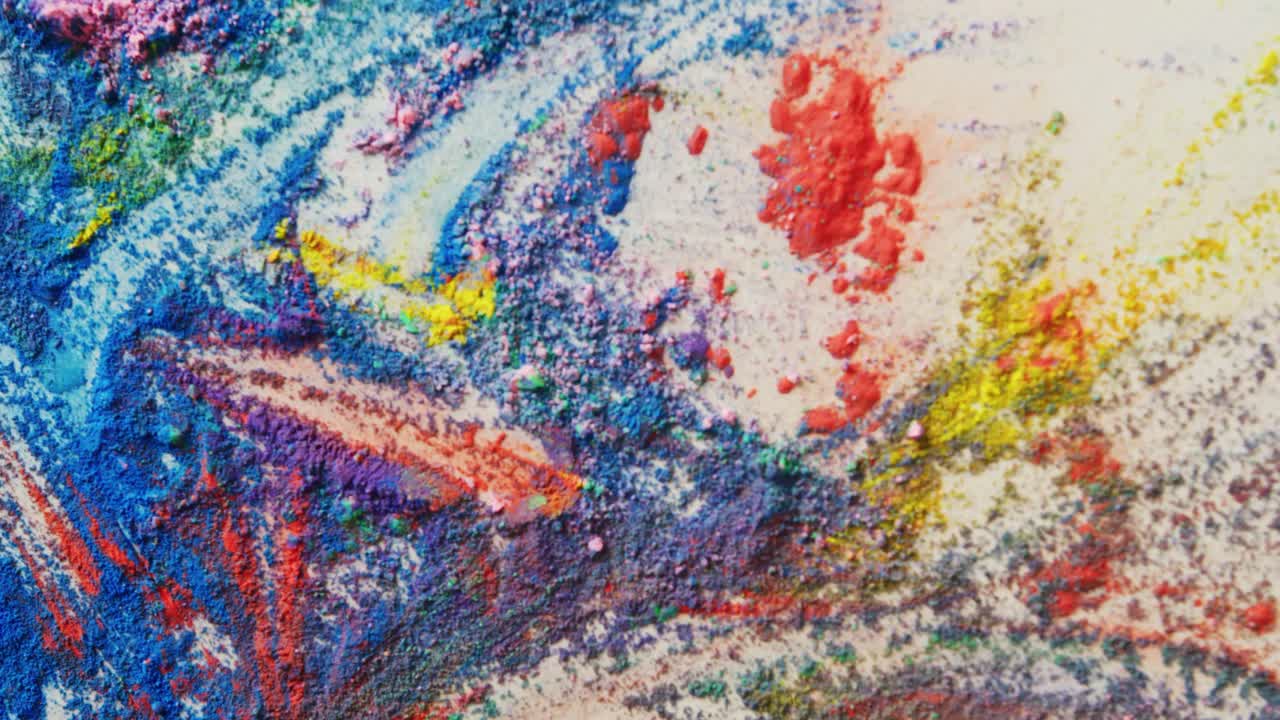 ⁇ 색 배경에 복사 공간이 있는 다채로운 파우더의 비디오