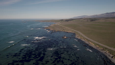 panoramic aerial view of the pacific coast highway near cambria and san simeon in california, united states.
