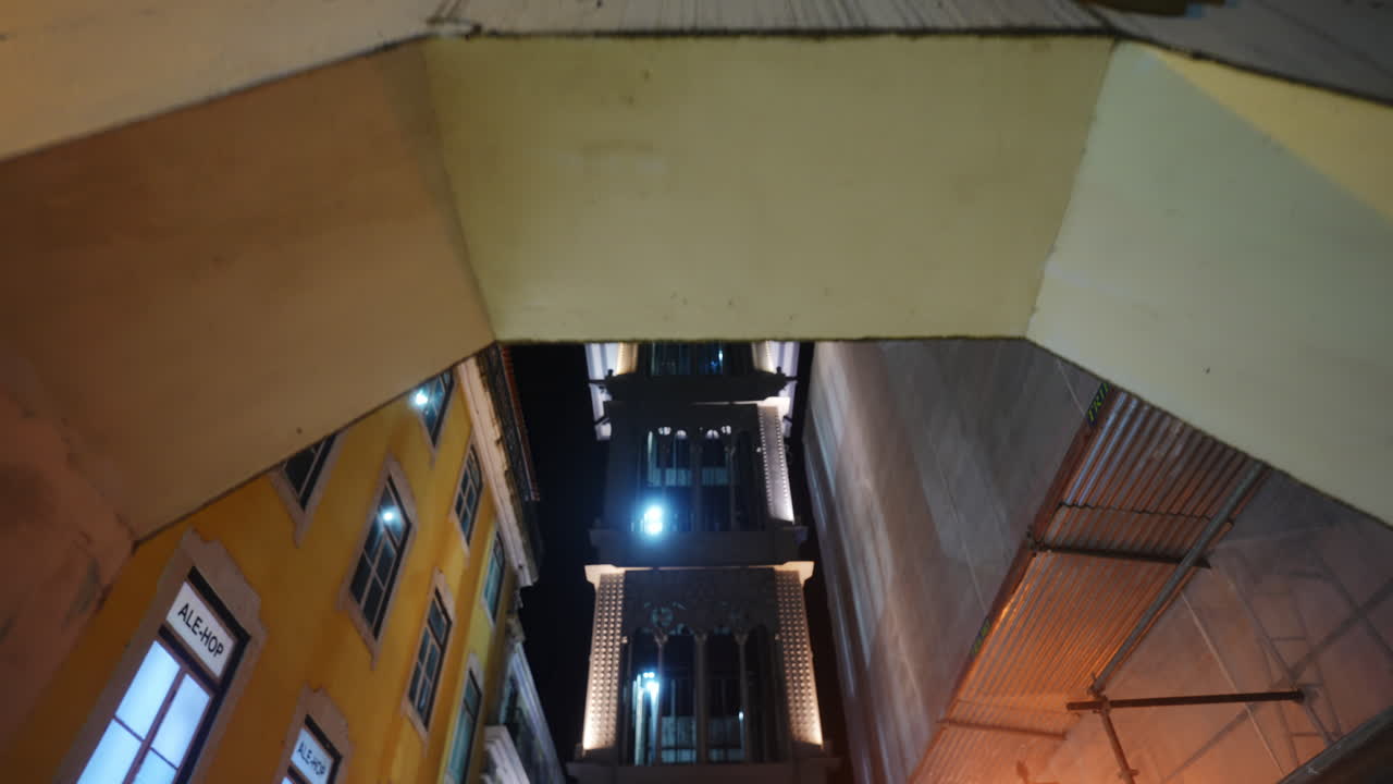 Low Angle View of Santa Justa Lift Illuminated at Night in Lisbon