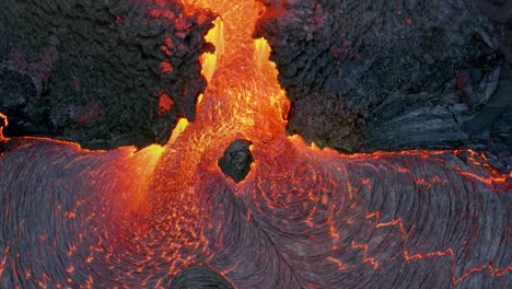 4K-drone-footage-capturing-aerial-perspectives,-cinematic-visuals,-distinctive-angles,-and-intense-close-up-shots-of-flowing-volcanic-lava