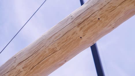 wooden beam with lifting equipment