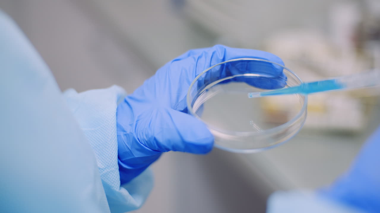 Portrait Of Female Scientist Analyzing With A Pipette At Laboratory 4