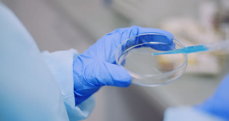 Portrait-Of-Female-Scientist-Analyzing-With-A-Pipette-At-Laboratory-4