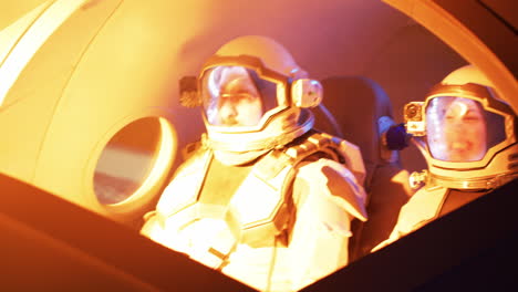 astronautas en la cabina de una nave espacial