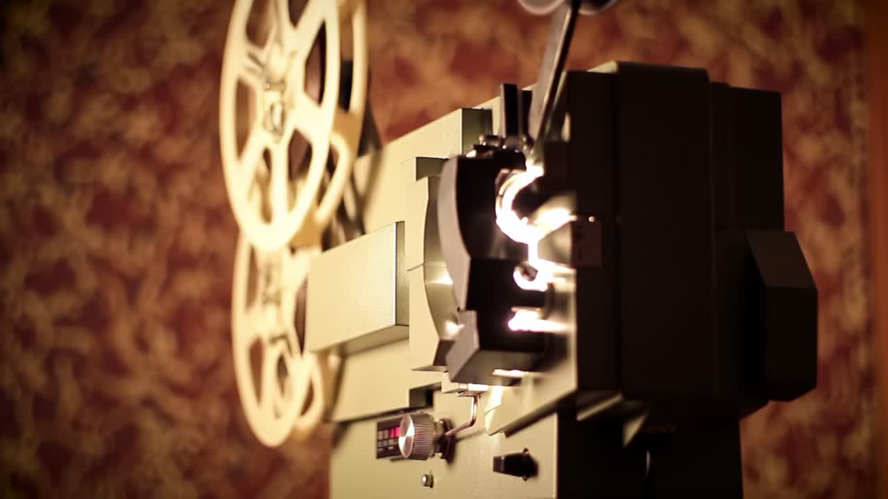 A Close-Up of a Vintage Film Projector Illuminating a Historic Background, Showcasing the Art of Cinematography and the Essence of Classic Film Presentation