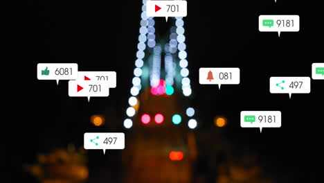 animación de iconos de redes sociales cayendo contra una vista aérea borrosa del tráfico nocturno de la ciudad