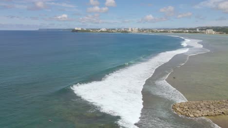 drone shot panning up over agana bay to view tamuning guam