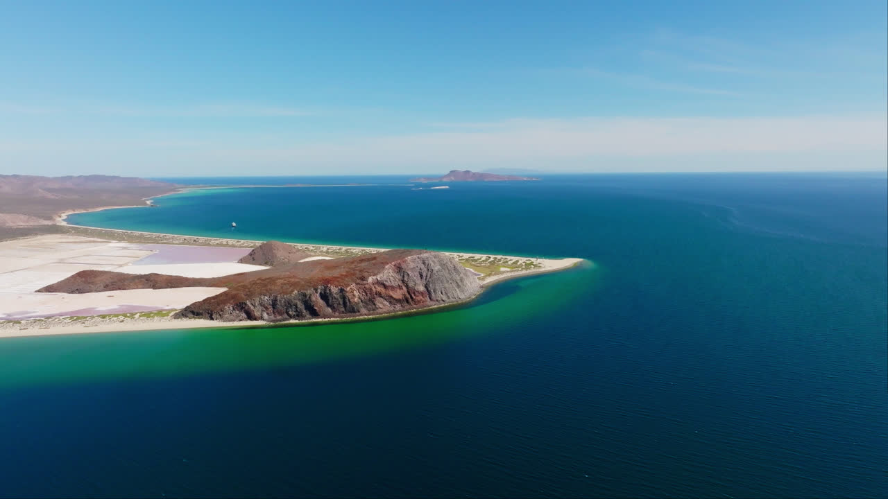 Aerial High Altitude View of Wild Coastal Bay Landscape, Rocky Hill Sandy Beach Shore and Turquoise Sea Water in Baja Mexico, Seaside and Seashore Landscape