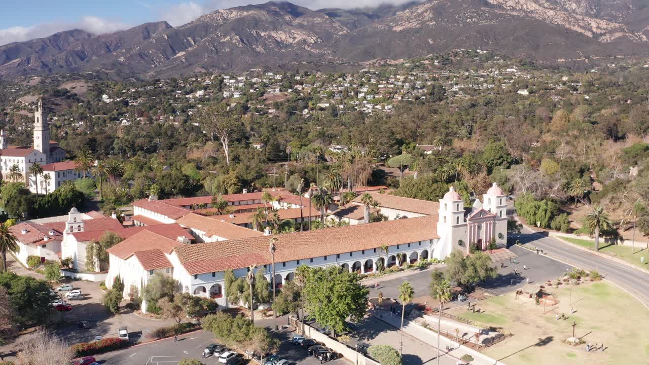 Aerial descending and panning shot of the 19th century Spanish Mission in Santa Barbara, California. 4K