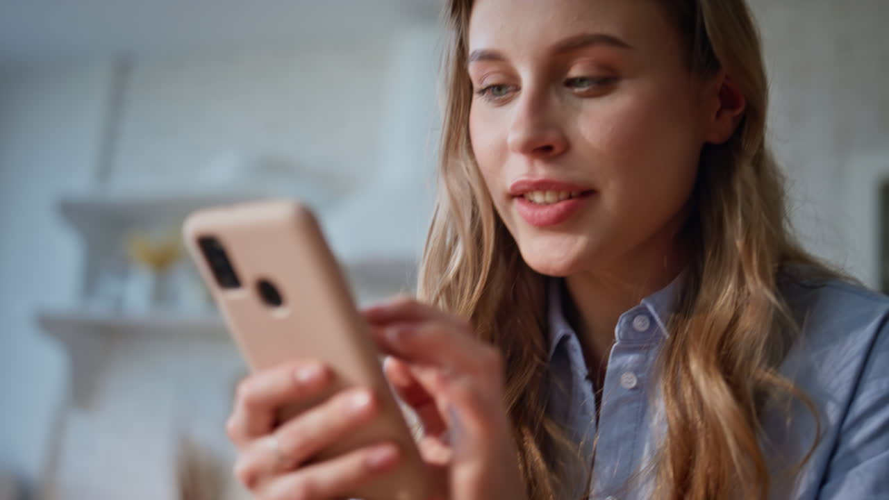 Woman hands typing sms at mobile phone alone closeup. Girl making online order