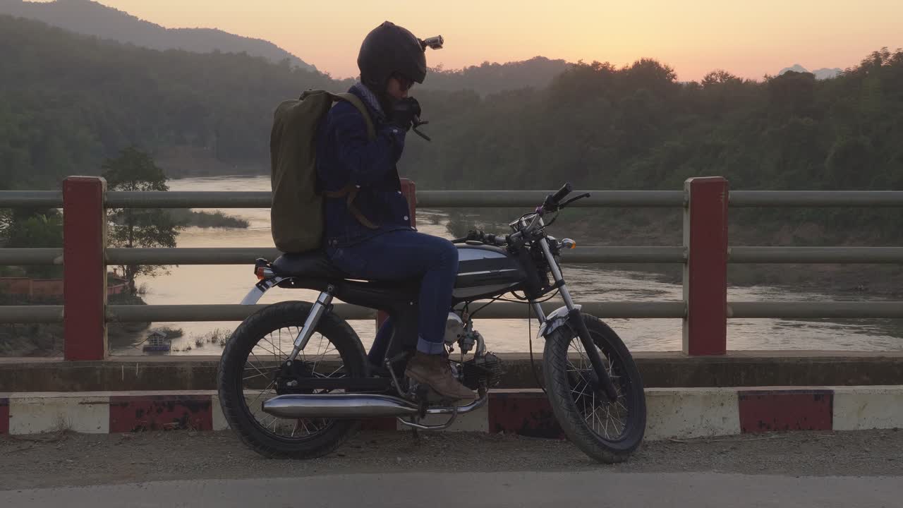 A solo motorcycle trip in the countryside at sunset
