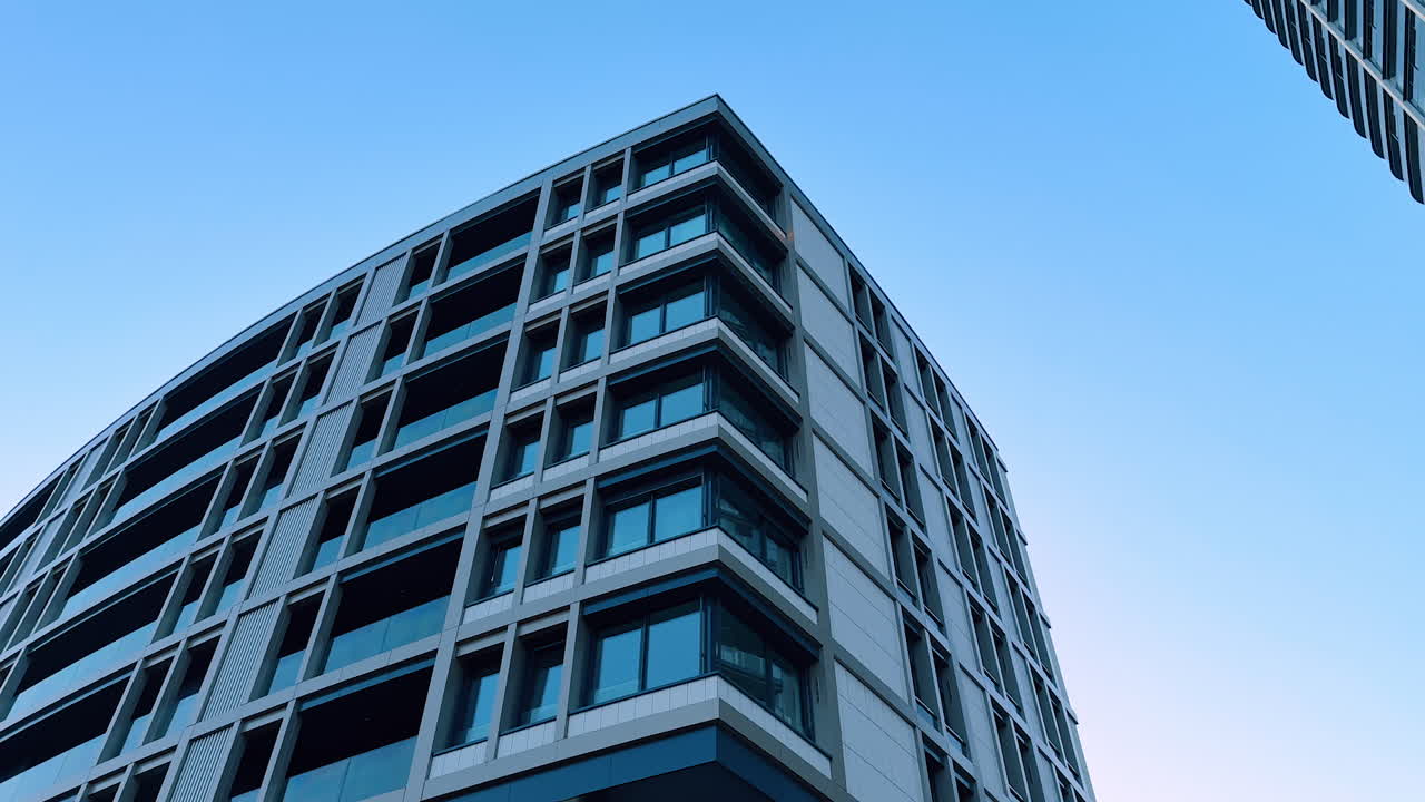 Facades of the modern high-rises from low angle perspective. Low angle view at the buildings of Bratislava, Slovakia