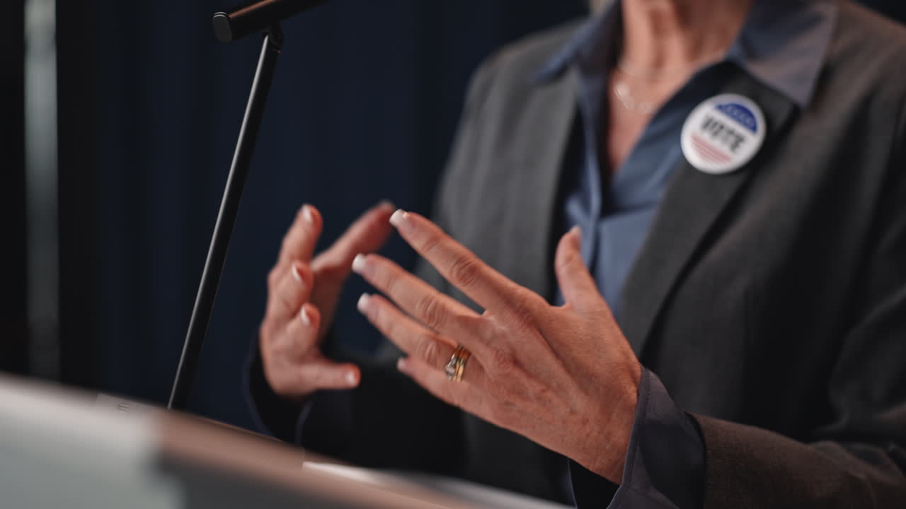Woman Speaking at Podium