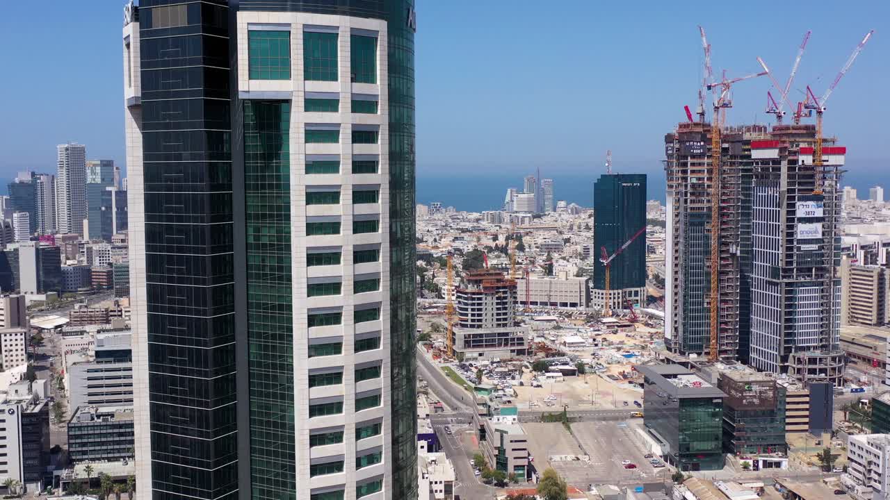 Aerial View of Modern Cityscape with Skyscrapers and Construction