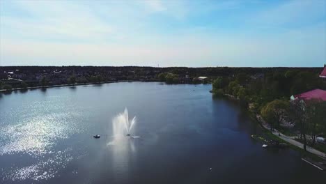 drone flying forwards a lake