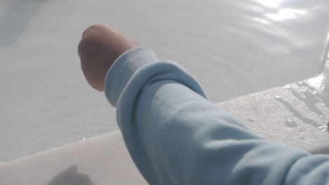 child playing in water