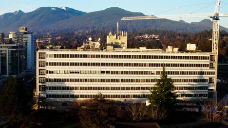 Exterior-Of-Lions-Gate-Hospital-In-North-Vancouver,-Canada---aerial-pullback