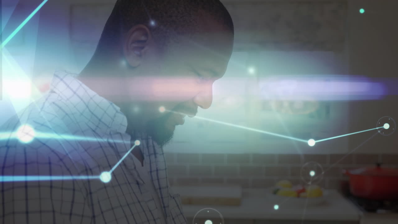Animation of networks of connections with icons over man using tablet