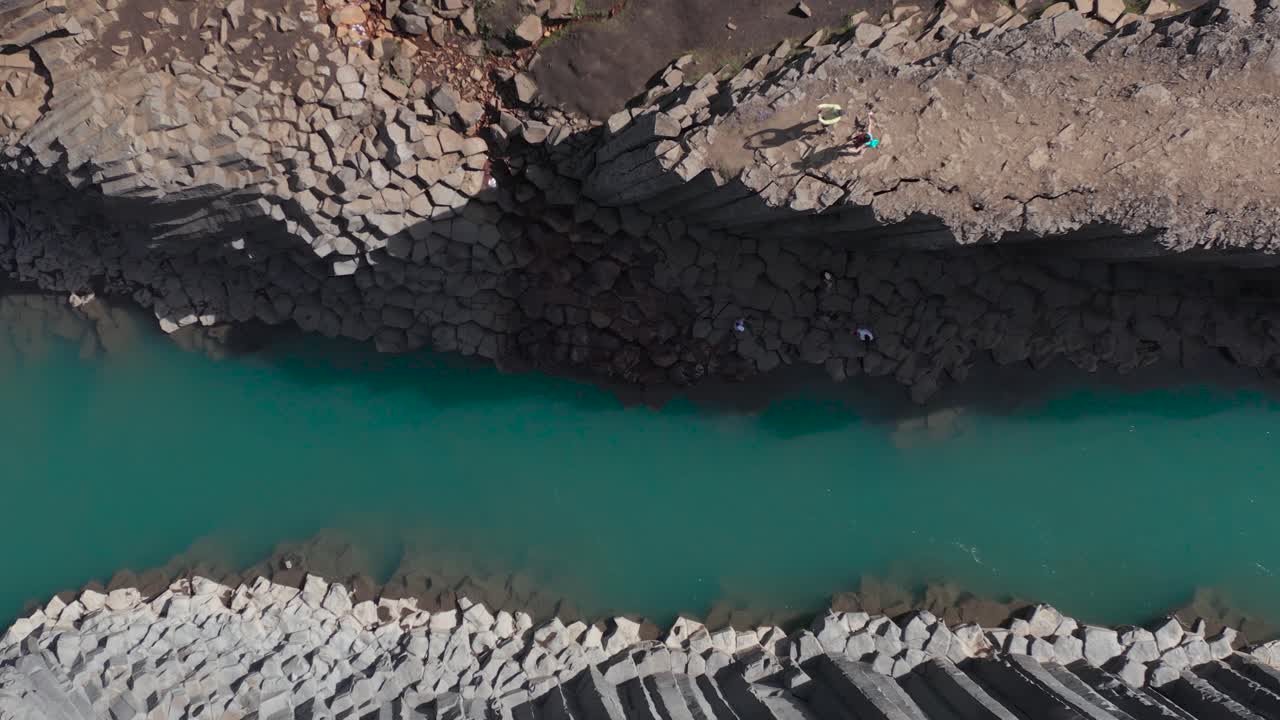 Top down of famous volcanic Stuðlagil basalt canyon in Iceland, aerial