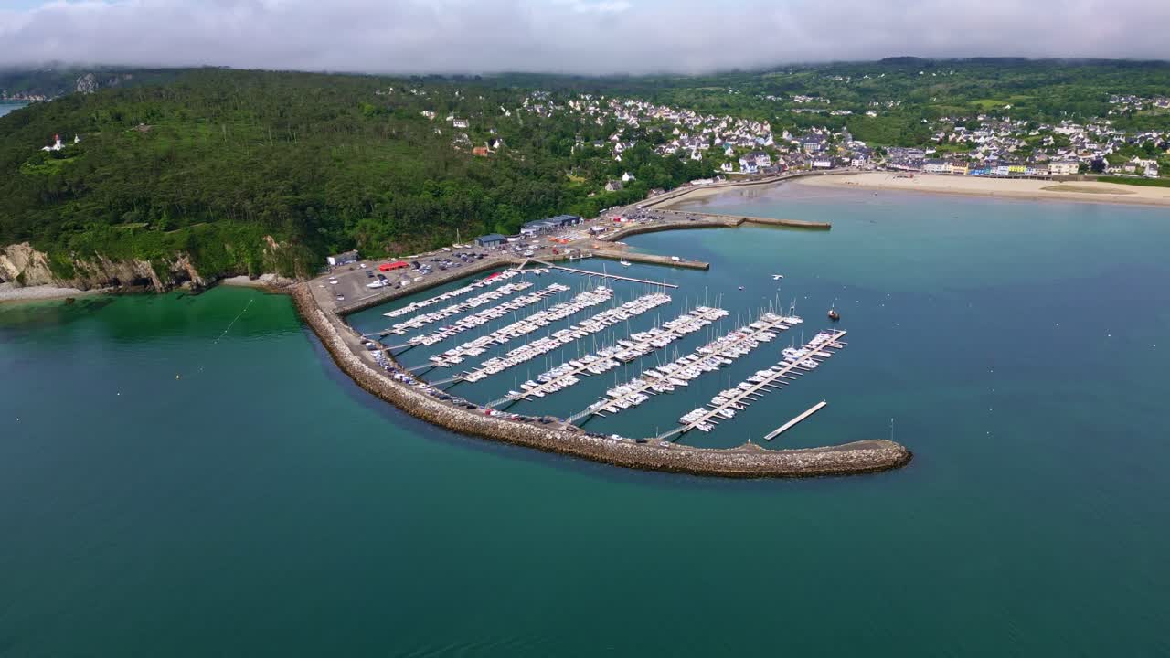 Aerial drone forward in of the marina Port de Plaisance de Morgat in Crozon, Brittany, France