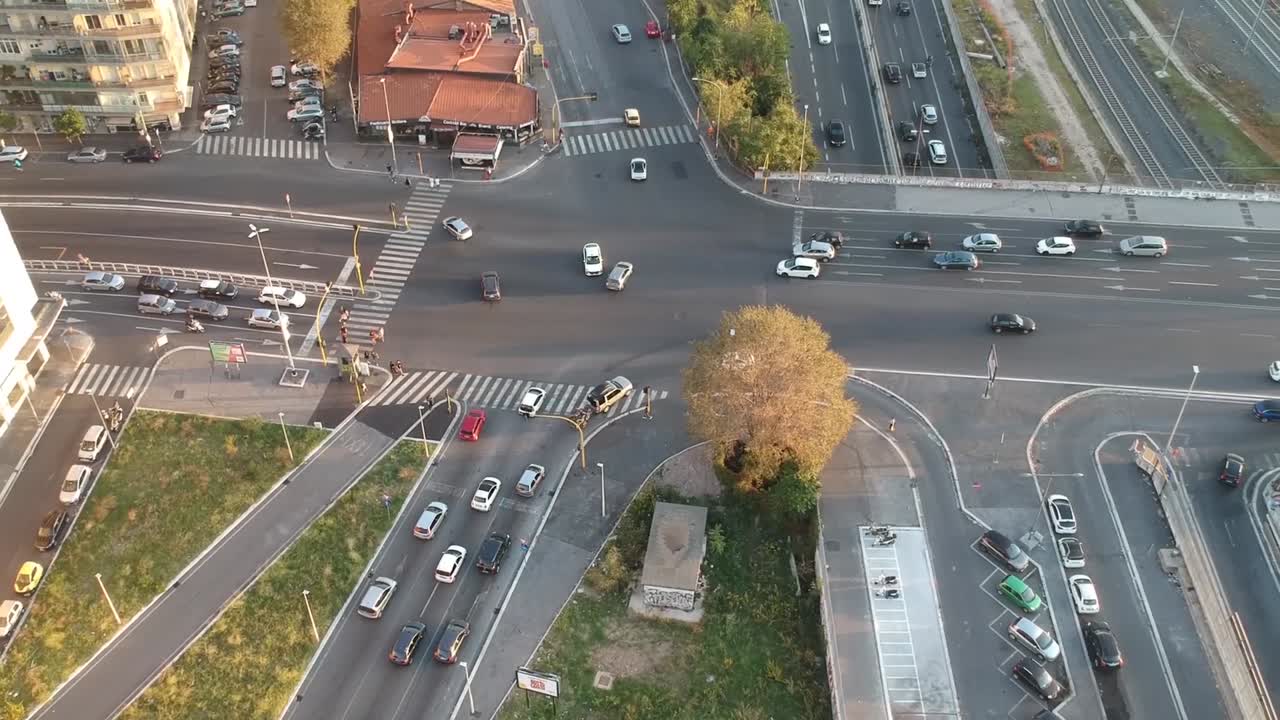Traffic on a busy crossroad, aerial drone