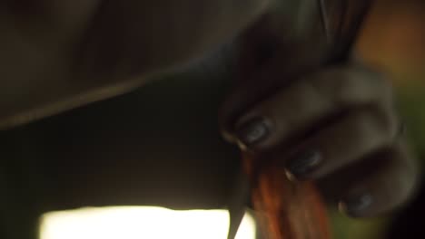 close-up view of hair being cut