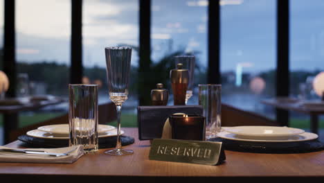 luxury restaurant reserved table in modern evening city cafe. dinner concept.