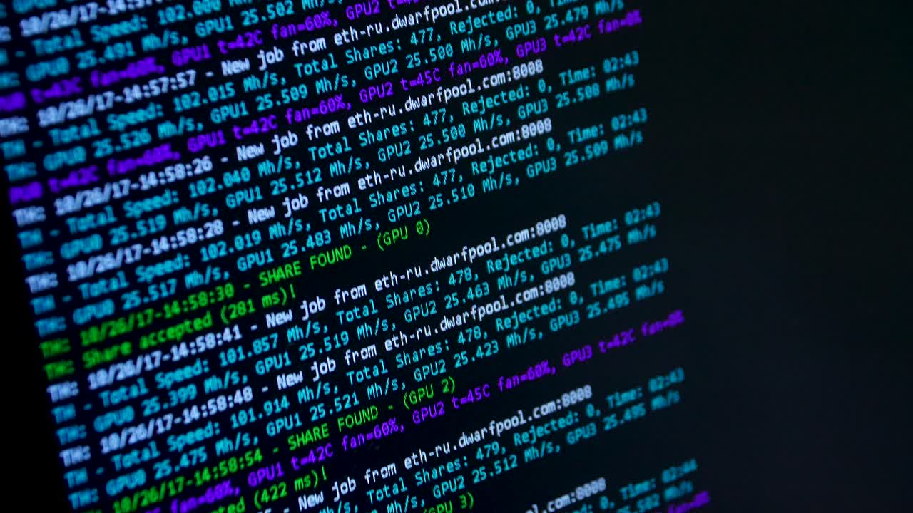 Computer terminal displaying cryptocurrency mining progress.