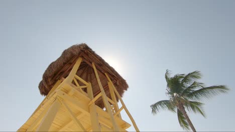 colorful rescue tower on beautiful tropical beach on a bright sunny day