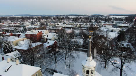 AERIAL-Fresh-Snowflakes-Falling-Over-Downtown-Lititz,-Pennsylvania,-USA