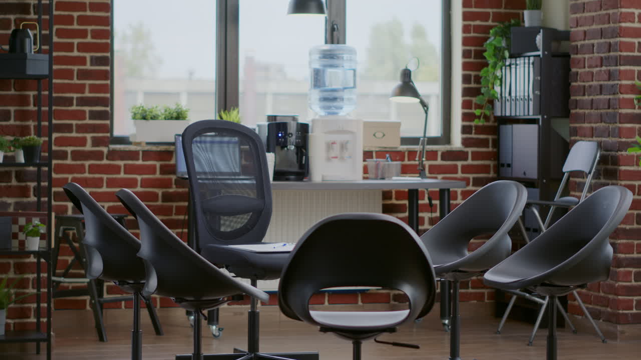 Nobody in space with chairs in circle and aa meeting sign on white board