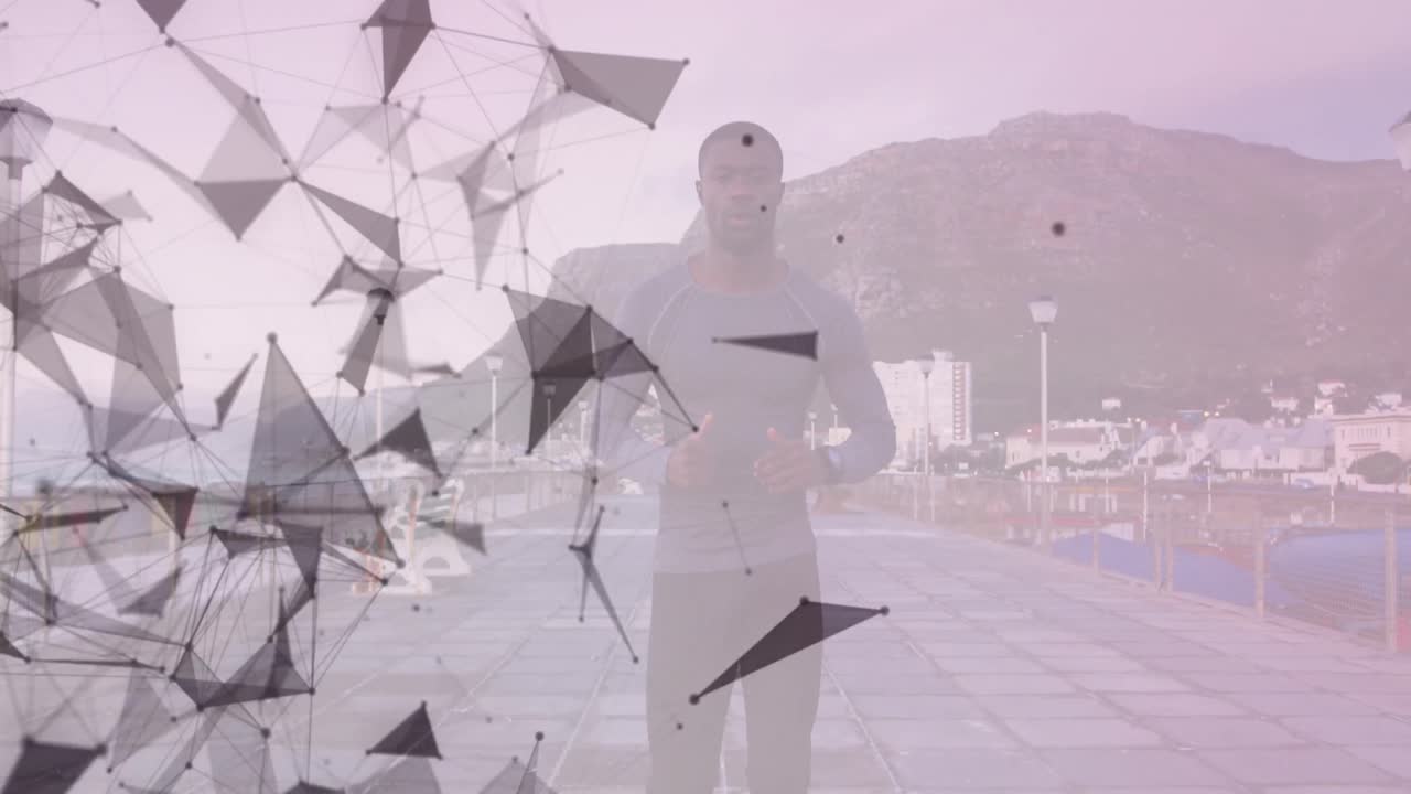 아프리카계 미국인  ⁇ 한 남자가 산책로에서 달리는 기하학적 모양의 애니메이션