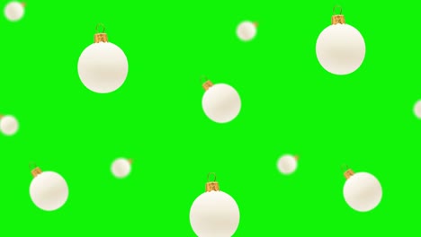 bola blanca voladora, juguete de árbol de navidad de diferentes diámetros en la pantalla verde en un fondo aislado. patrón de fondo en movimiento. fondo animado. imágenes de dulces de navidad 4k de alta calidad