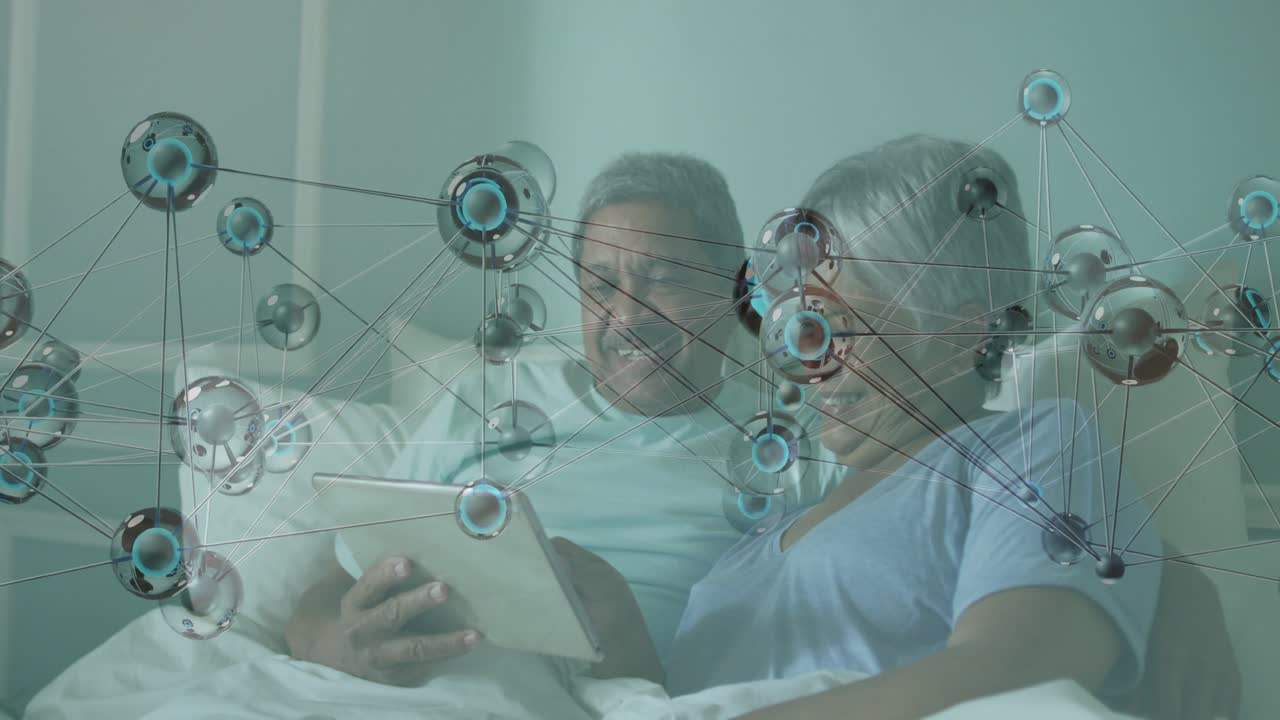 Senior couple reclining tapping tablet starting 3D network drifting across them exploring content
